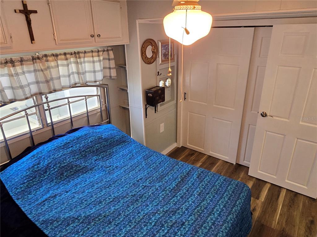 2043 Ketch Circle Palm Harbor, FL 34683 - Photo 25 of 32 a kitchen with stainless steel appliances granite countertop a refrigerator and a stove top oven