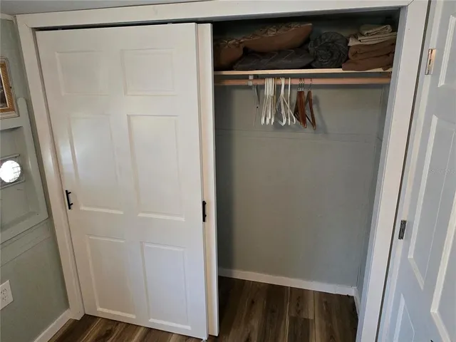 a view of a hallway with front door