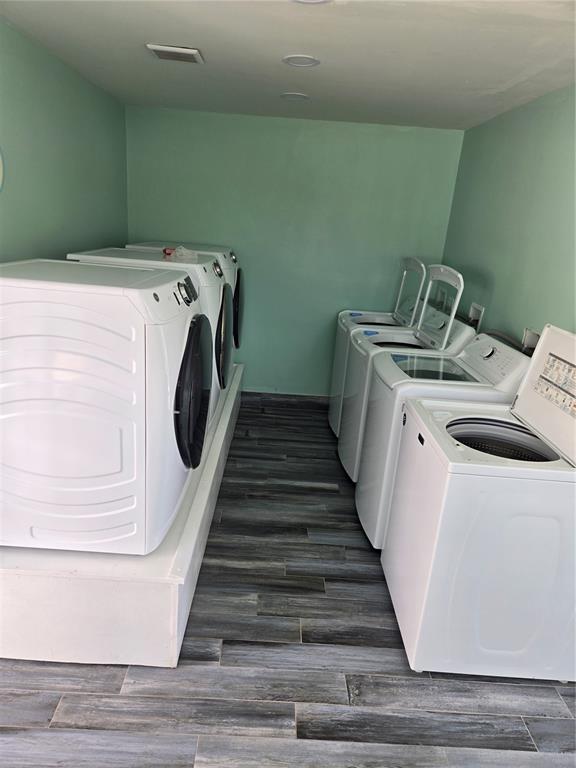 2043 Ketch Circle Palm Harbor, FL 34683 - Photo 29 of 32 a utility room with dryer and washer