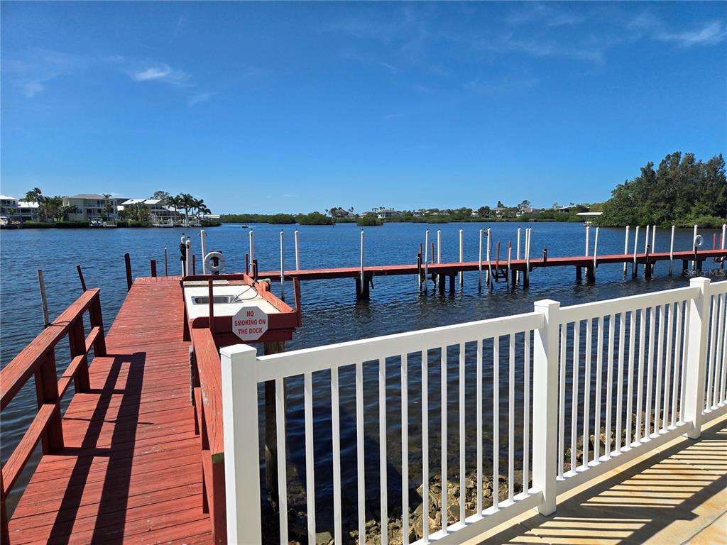 2043 Ketch Circle Palm Harbor, FL 34683 - Photo 31 of 32 a balcony with table and chairs