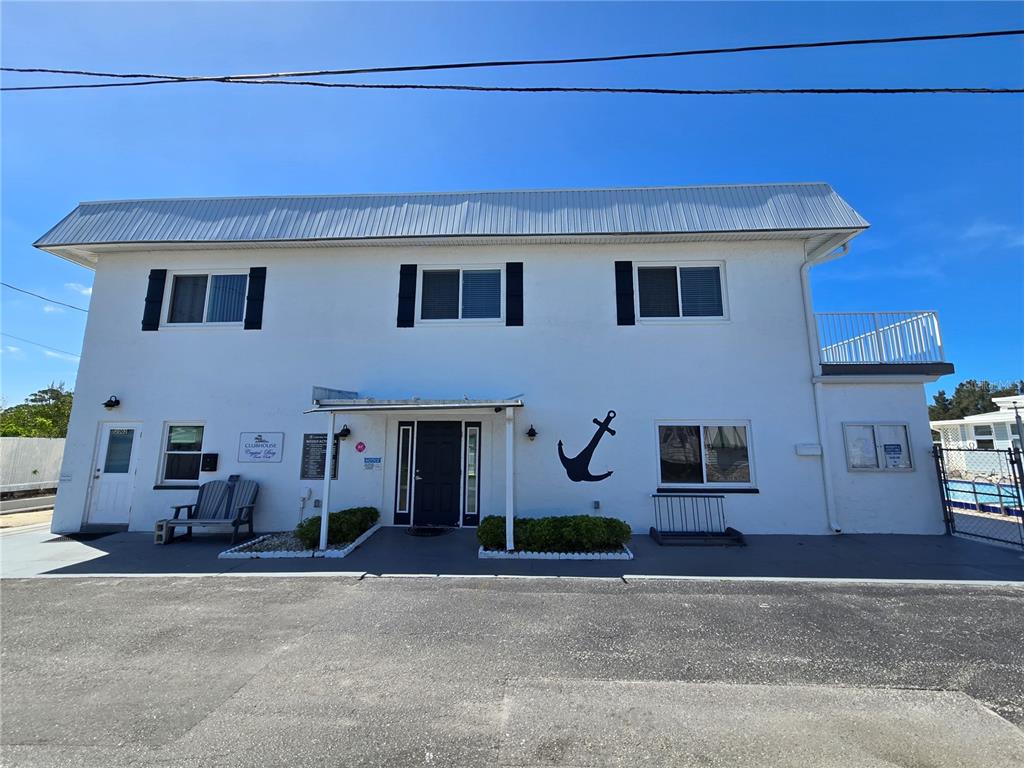 2043 Ketch Circle Palm Harbor, FL 34683 - Photo 32 of 32 a view of a house with a street