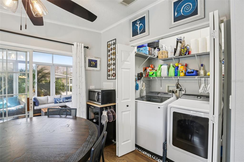 358 Lake Way Oldsmar, FL 34677 - Photo 16 of 48 a kitchen with stainless steel appliances granite countertop a stove and white cabinets