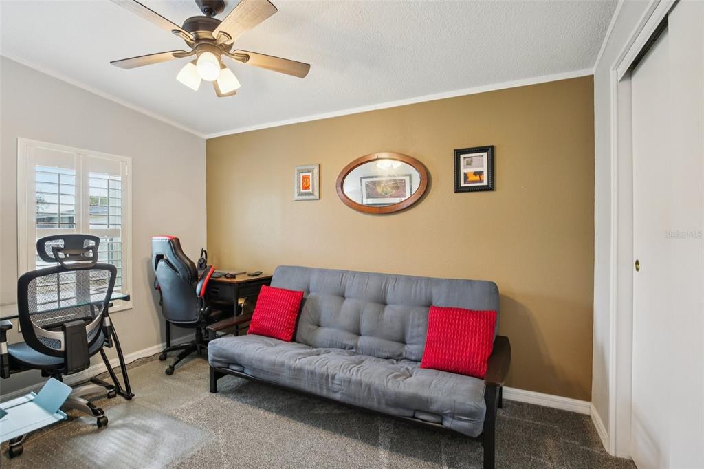 358 Lake Way Oldsmar, FL 34677 - Photo 17 of 48 a living room with furniture and a window