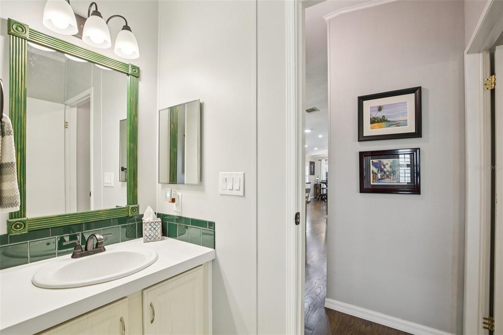 358 Lake Way Oldsmar, FL 34677 - Photo 21 of 48 a bathroom with a sink vanity and a mirror