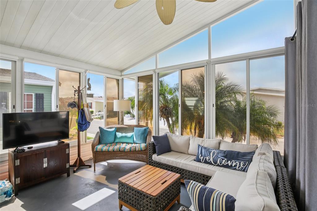 358 Lake Way Oldsmar, FL 34677 - Photo 30 of 48 a living room with furniture and a flat screen tv