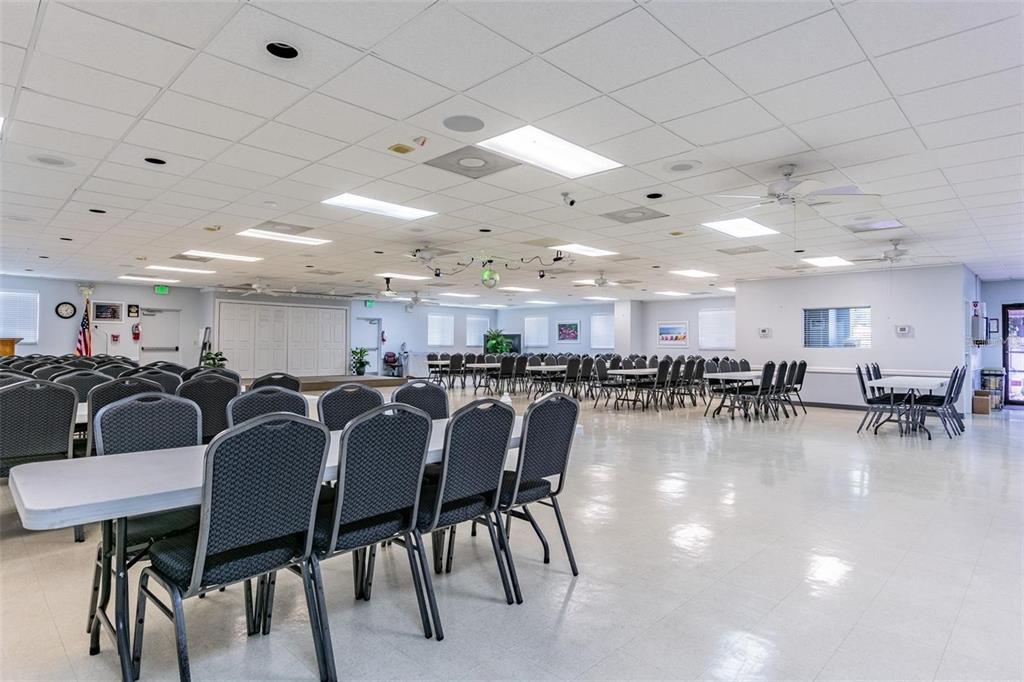 358 Lake Way Oldsmar, FL 34677 - Photo 38 of 48 a view of a dining area with furniture and a chandelier