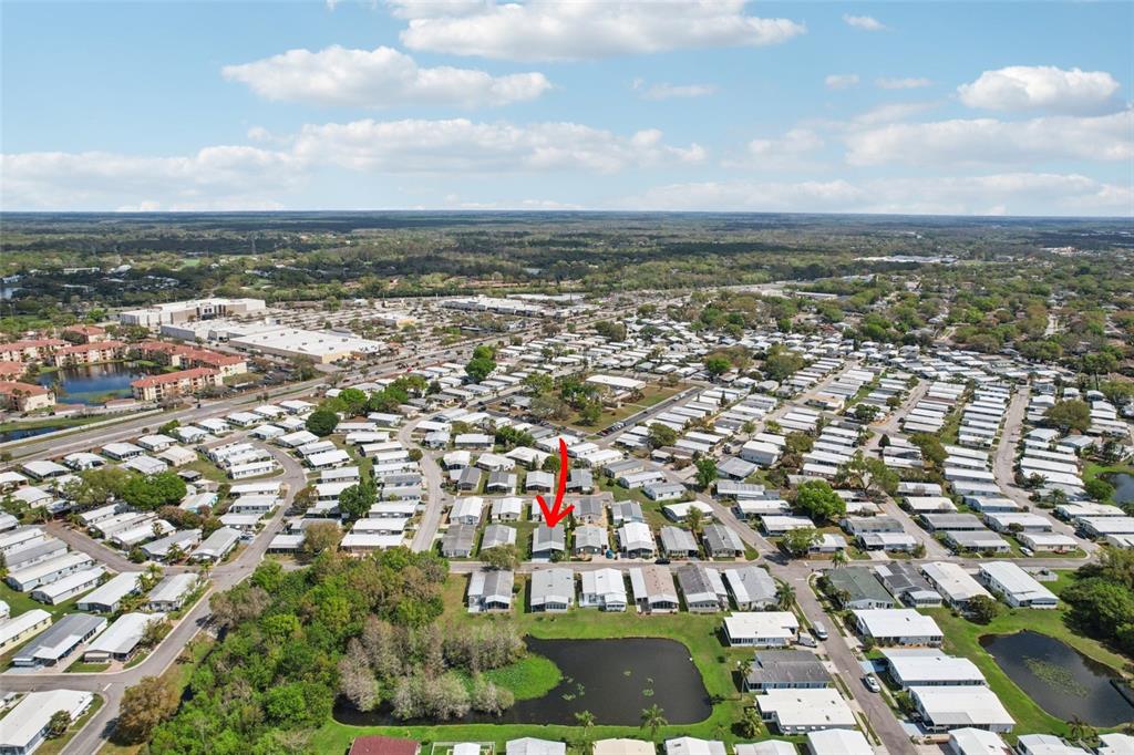 358 Lake Way Oldsmar, FL 34677 - Photo 44 of 48 an aerial view of residential building and lake