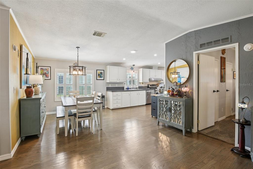 358 Lake Way Oldsmar, FL 34677 - Photo 9 of 48 a view of kitchen with furniture and wooden floor