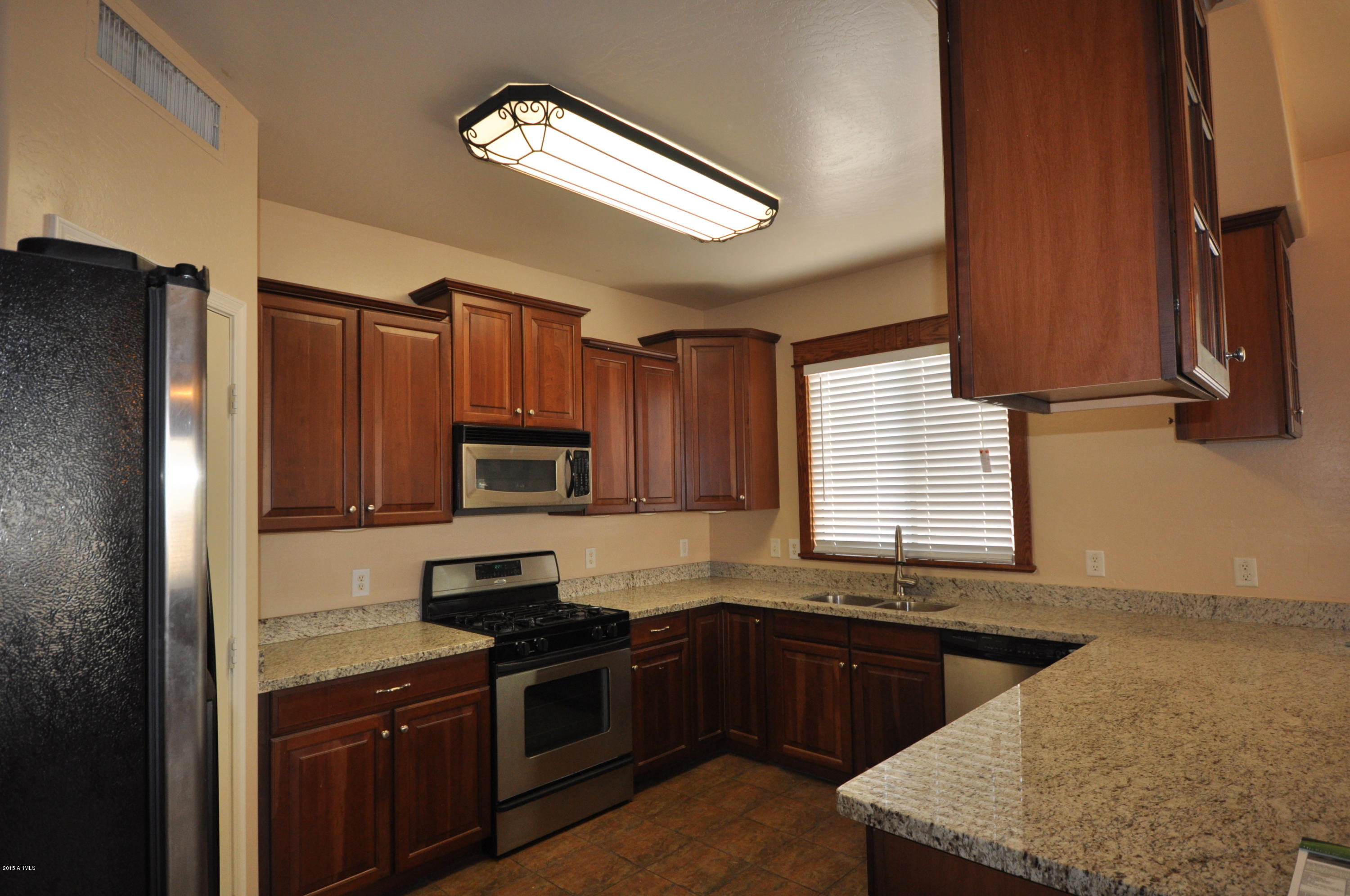 4202 West Carter Road Phoenix, AZ 85041 - Photo 8 of 34 DSC_0969