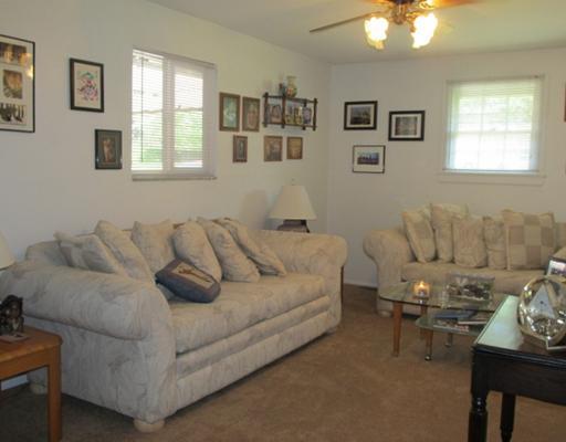 858 5 Pines Road North Huntingdon, PA 15642 - Photo 11 of 18 Den/Family/Great Room. Spacious room (additional living room off garage). Neutral decor. The 3 living areas of this home versatile.