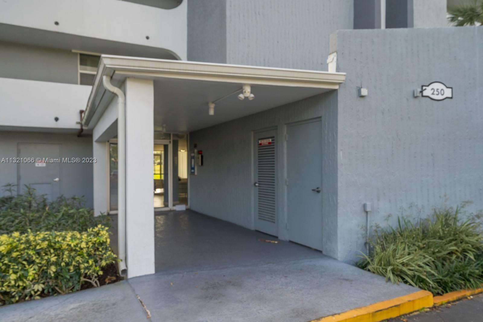 250 Northwest 67th Street, Unit 417 Boca Raton, FL 33487 - Photo 24 of 27 a view of an entryway