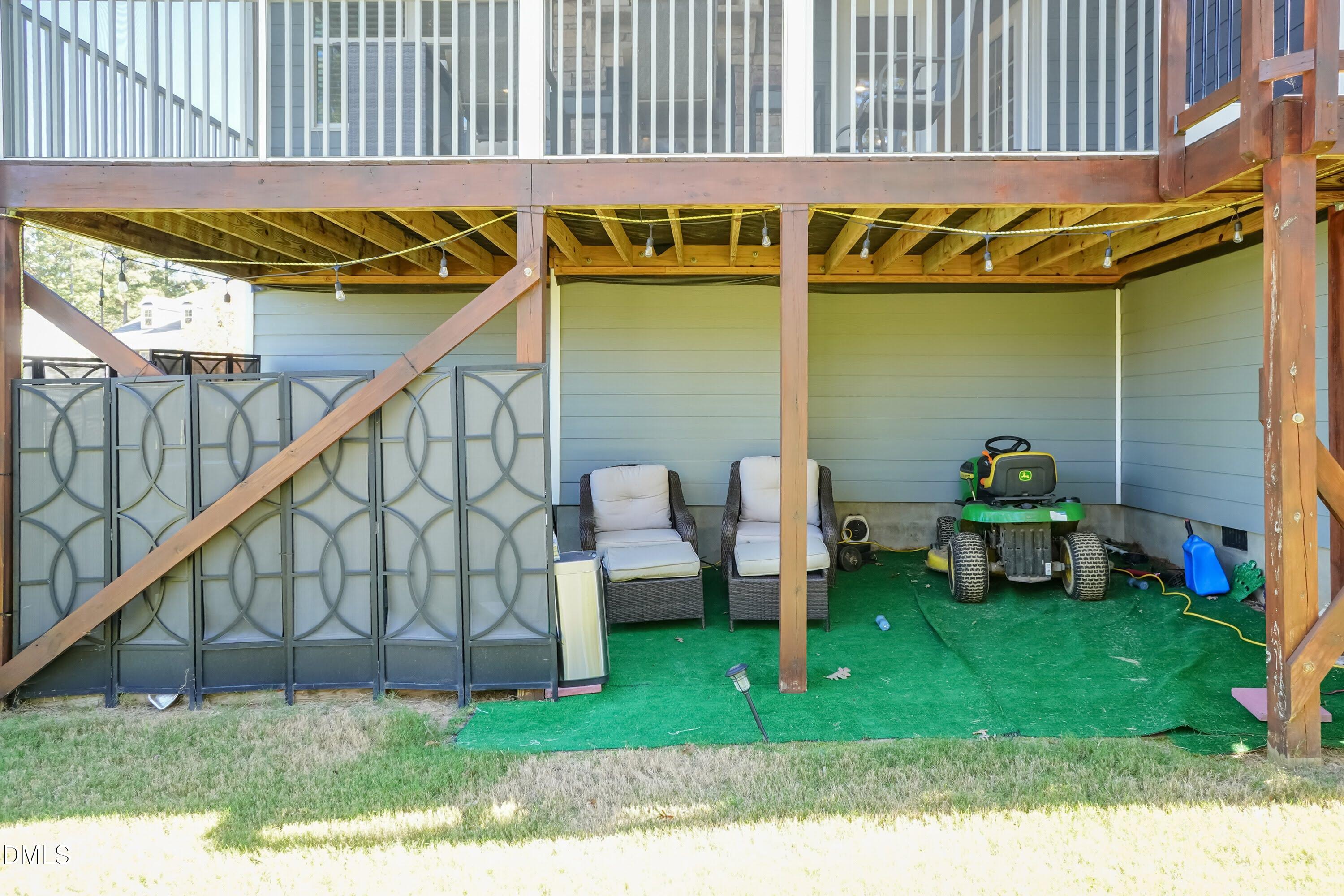 1009 Crescent Moon Court Durham, NC 27712 - Photo 14 of 57 a view of a chair and table in the house