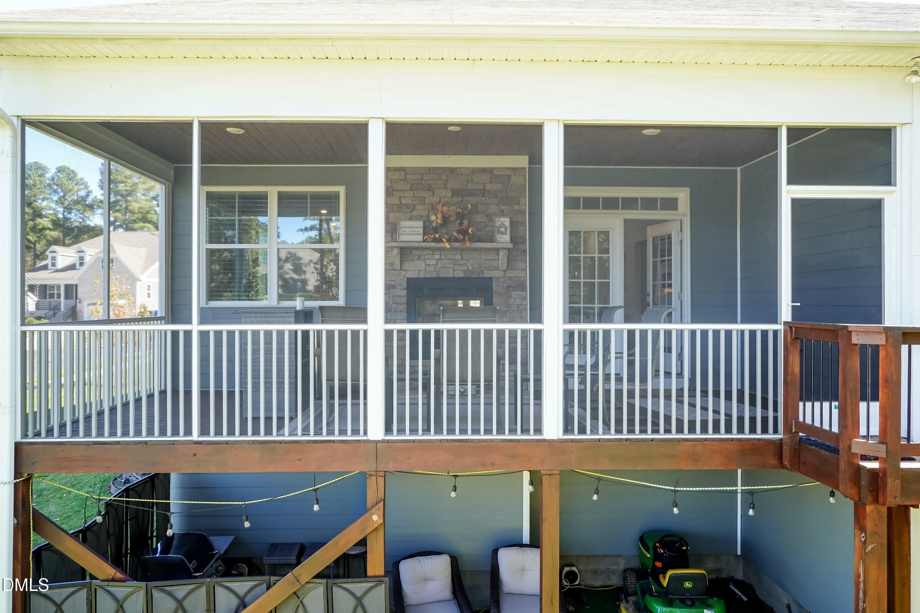 1009 Crescent Moon Court Durham, NC 27712 - Photo 16 of 57 a view of a balcony with two chairs