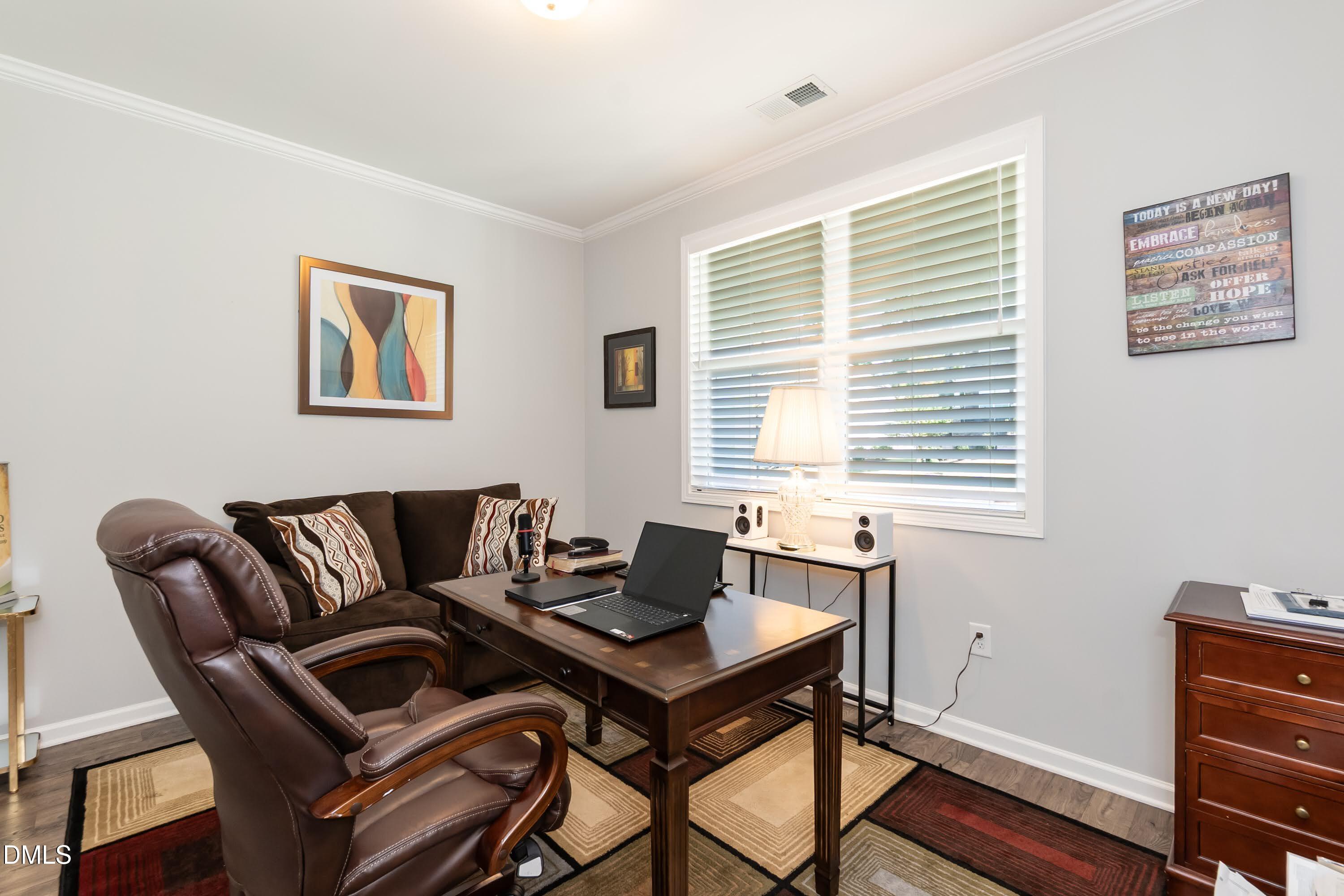 1009 Crescent Moon Court Durham, NC 27712 - Photo 21 of 57 a living room with furniture and a window
