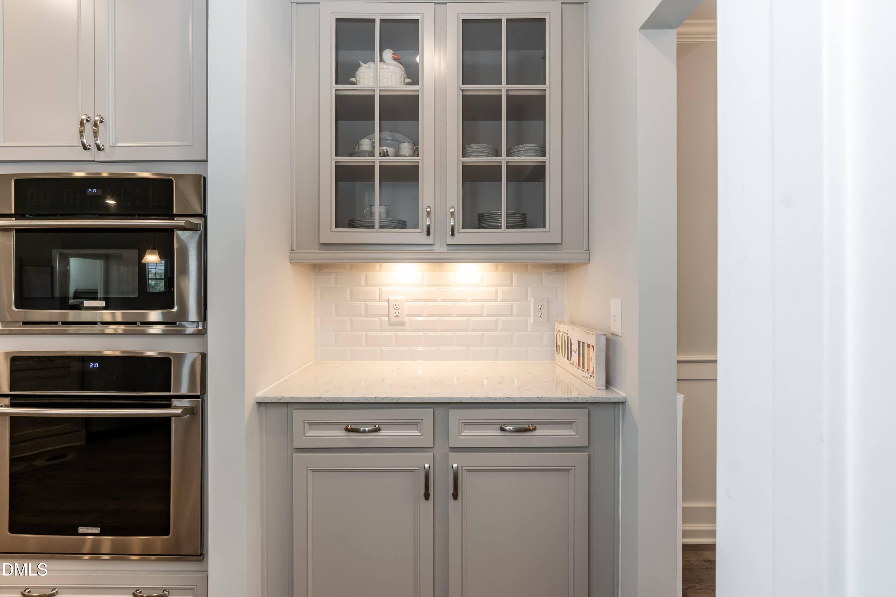 1009 Crescent Moon Court Durham, NC 27712 - Photo 30 of 57 a kitchen with a sink and a microwave