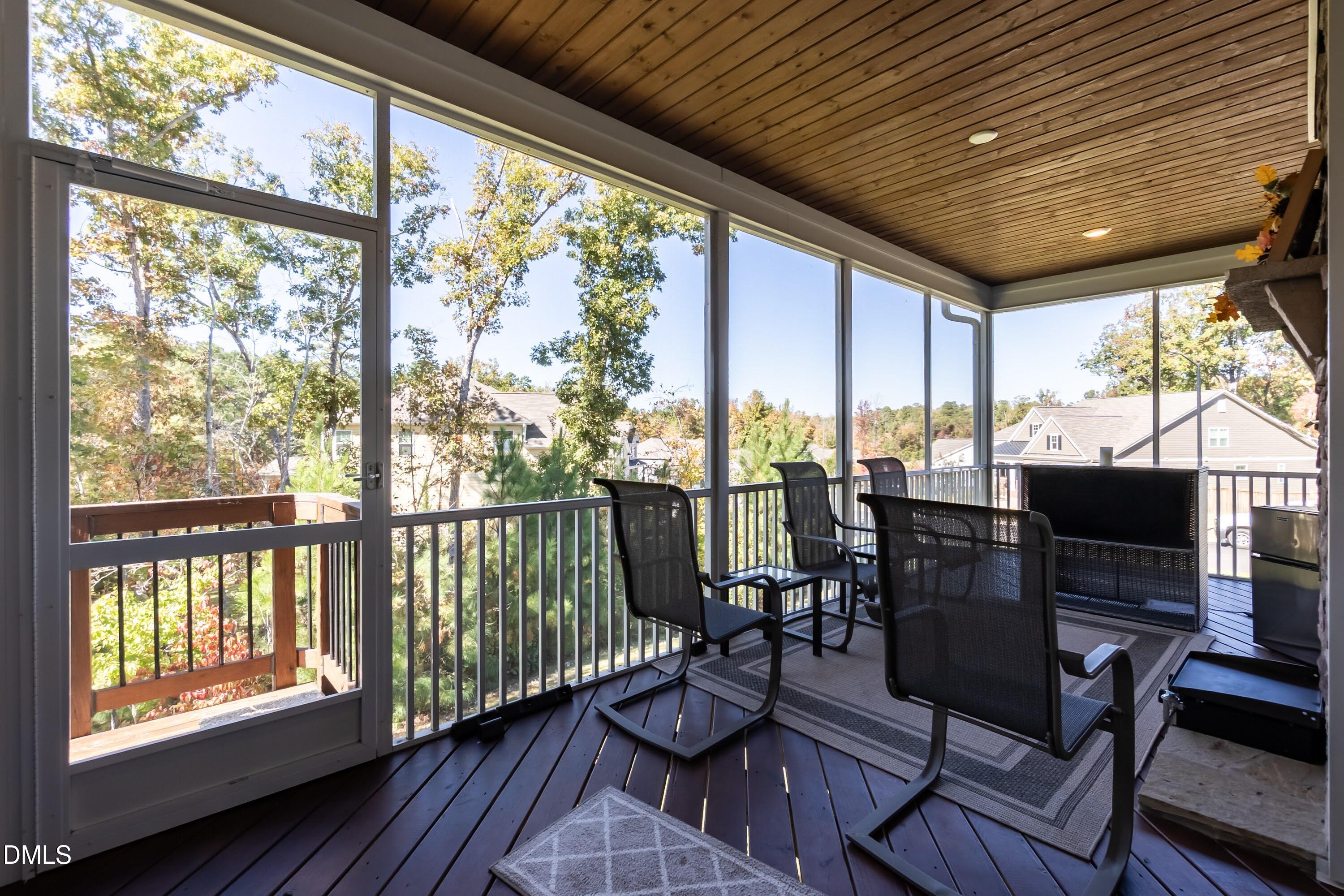1009 Crescent Moon Court Durham, NC 27712 - Photo 37 of 57 a view of a dining room with furniture window and outside view