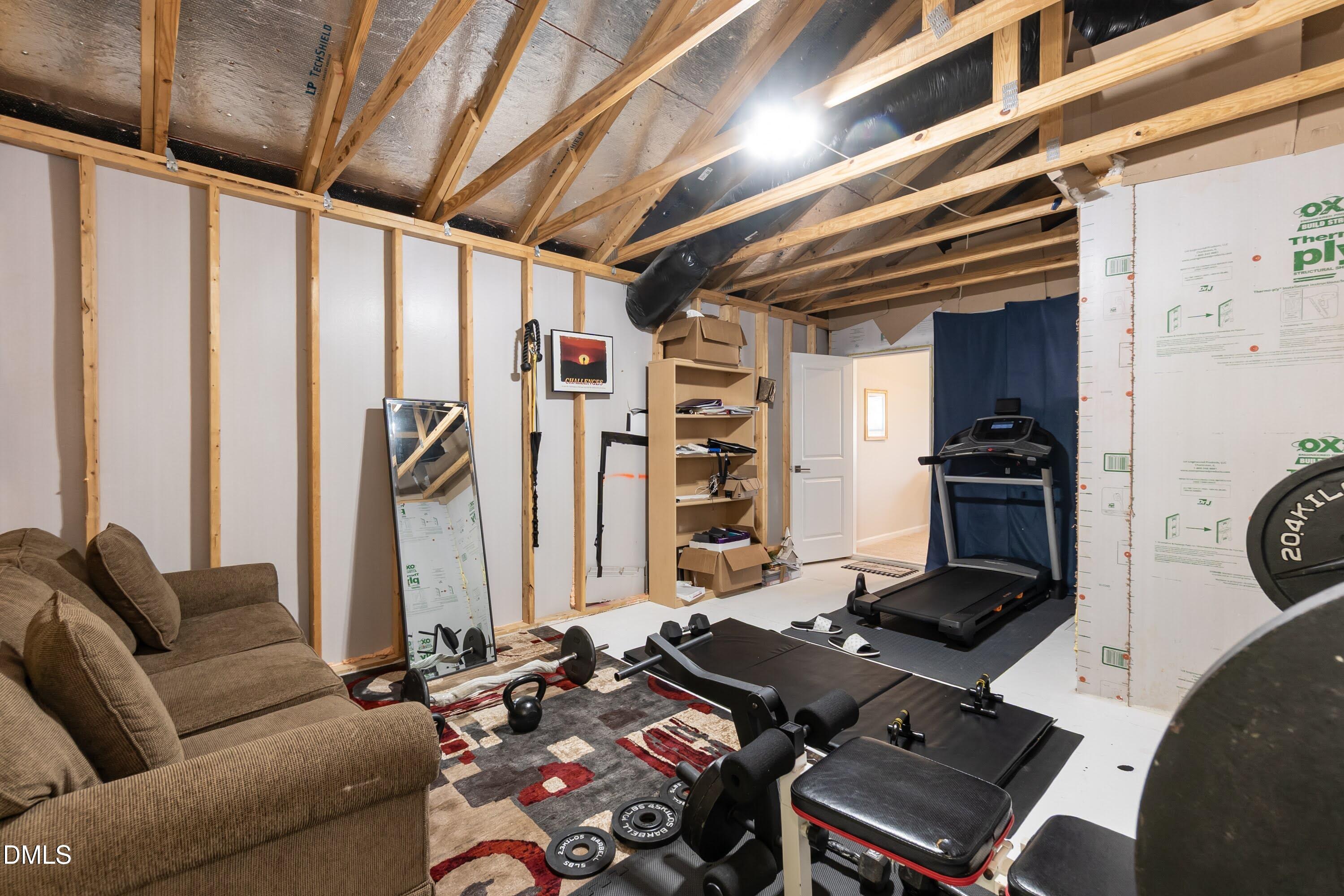 1009 Crescent Moon Court Durham, NC 27712 - Photo 54 of 57 a living room with furniture and a window