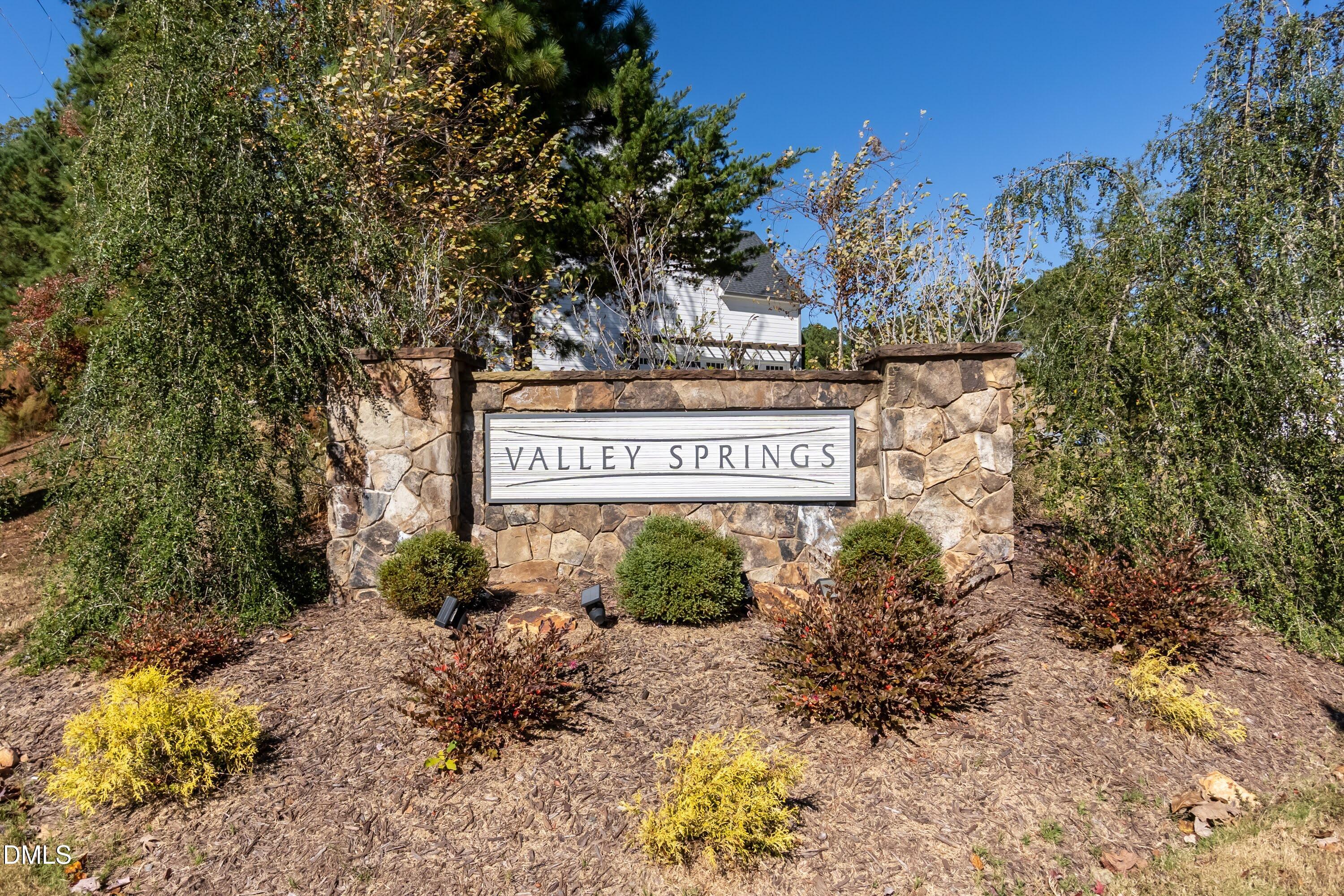 1009 Crescent Moon Court Durham, NC 27712 - Photo 55 of 57 a sign of golf club on a stone wall
