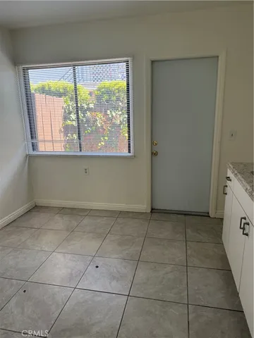 a view of a kitchen with a window