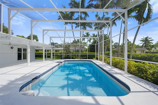 a view of a house with a swimming pool