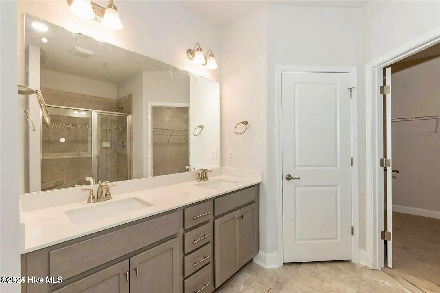 184 Poker House Road Grimesland, NC 27837 - Photo 22 of 26 Photos are of the same floor plan in a different community and are for layout and demo purposes only. Upgrades, colors and finishes may differ. Home is currently under construction.