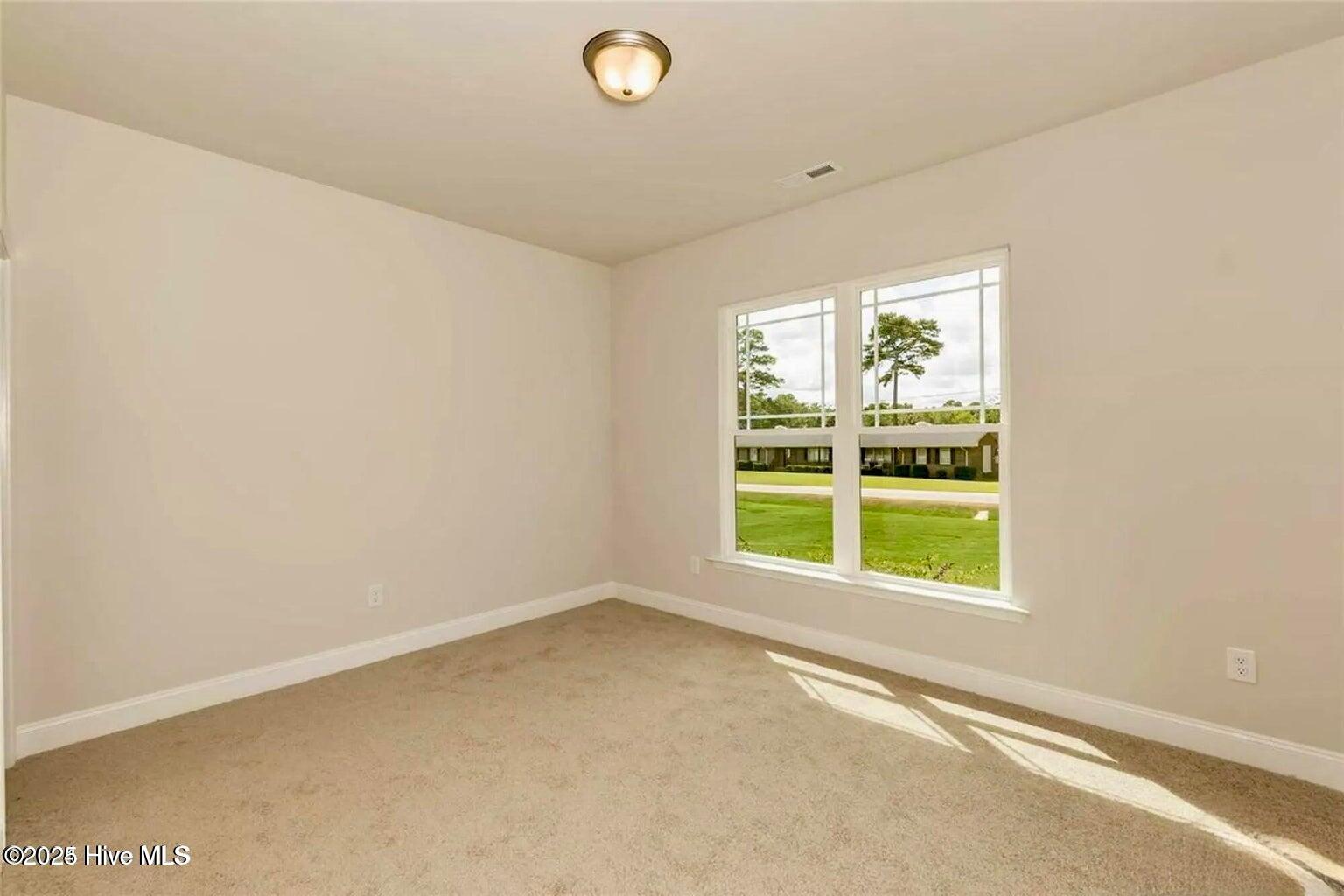 184 Poker House Road Grimesland, NC 27837 - Photo 23 of 26 Photos are of the same floor plan in a different community and are for layout and demo purposes only. Upgrades, colors and finishes may differ. Home is currently under construction.