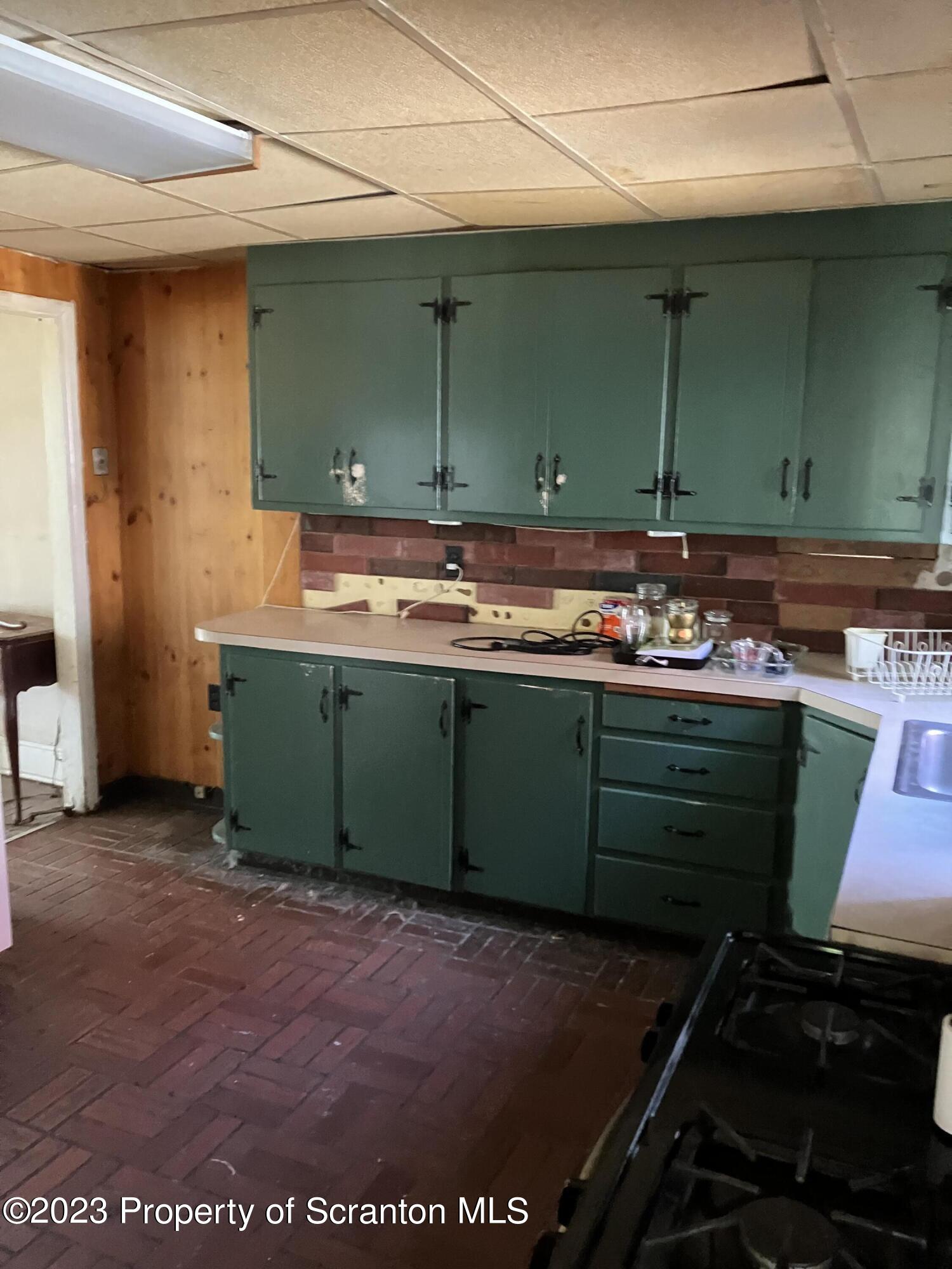 321 Maple Street Montrose, PA 18801 - Photo 13 of 28 a room with a sink and a mirror