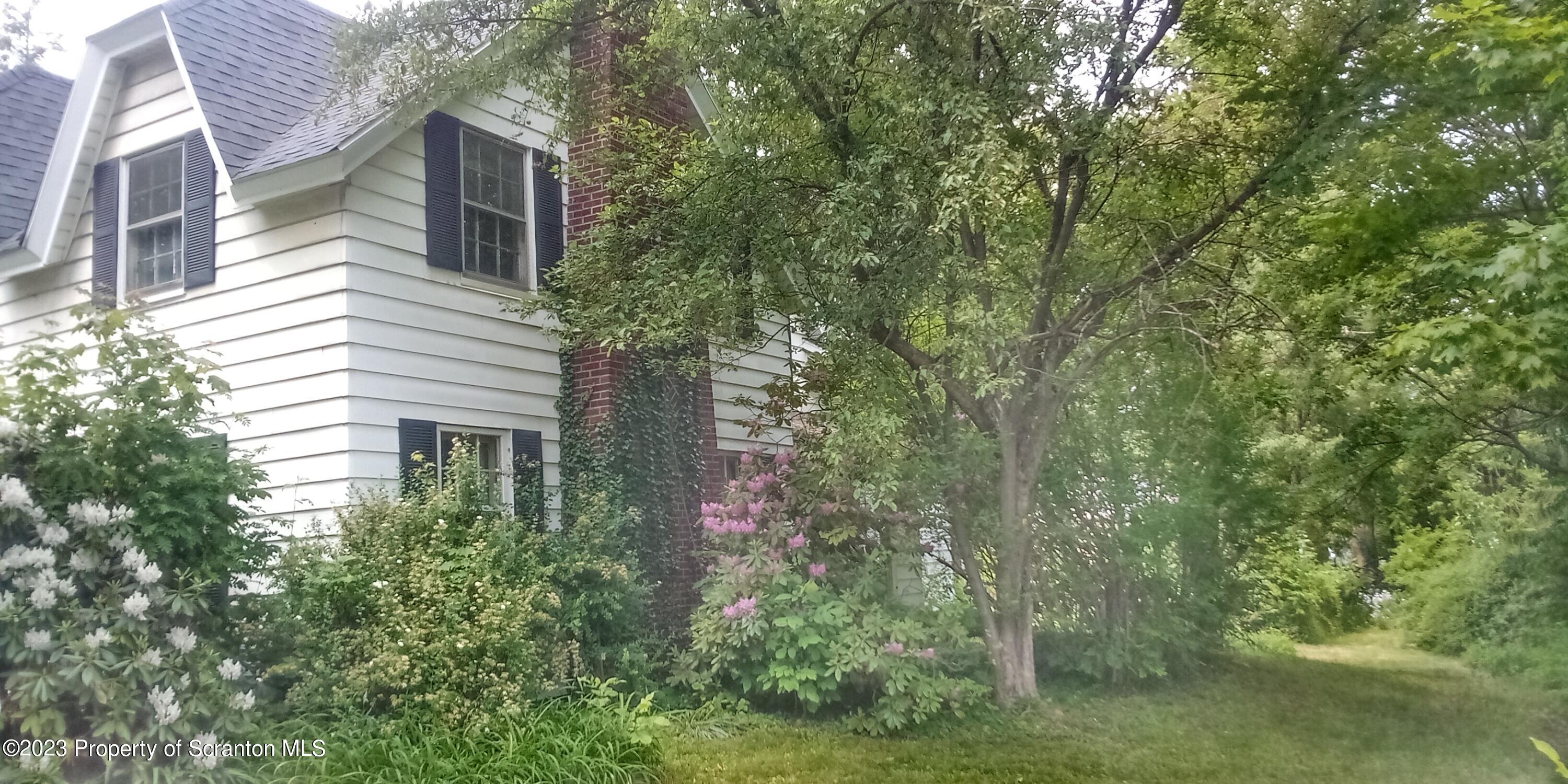 321 Maple Street Montrose, PA 18801 - Photo 5 of 28 a view of a house with a yard