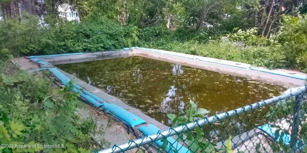 a view of a garden from a balcony