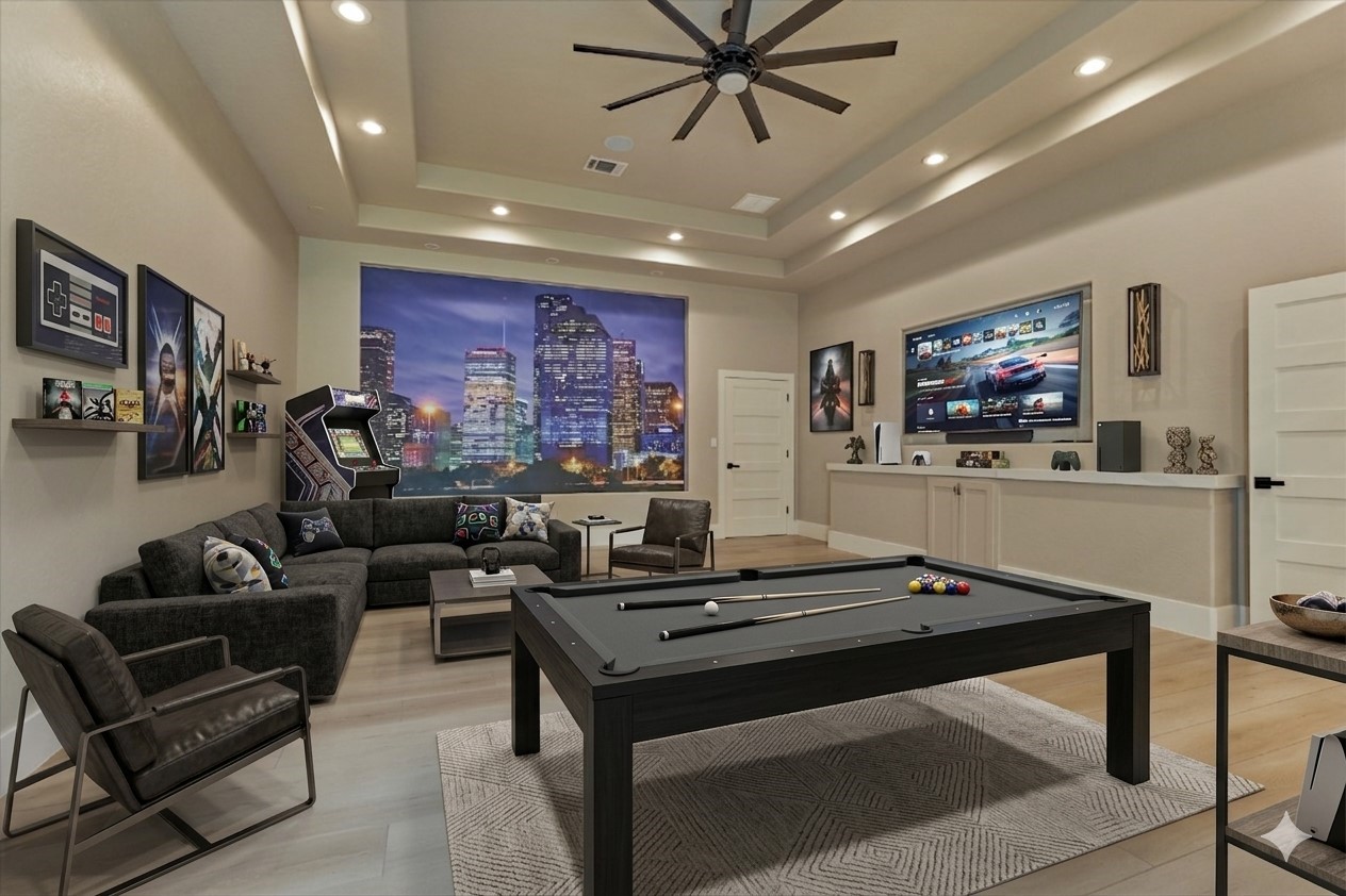 1907 Woerner Road Houston, TX 77090 - Photo 44 of 50 **This is virtually staged** Family room/game room in private guest house with custom H-Town mural and wet bar area.