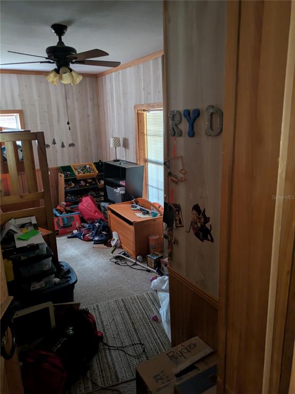 2833 Southwest Wilson Springs Road Fort White, FL 32038 - Photo 15 of 27 a room with furniture and a window