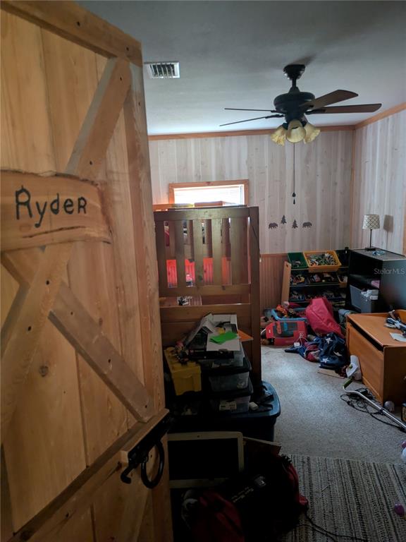 2833 Southwest Wilson Springs Road Fort White, FL 32038 - Photo 16 of 27 a view of a room with gym equipment
