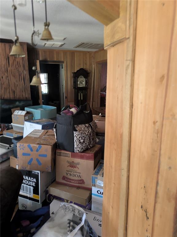 2833 Southwest Wilson Springs Road Fort White, FL 32038 - Photo 21 of 27 a living room with furniture a window and a fireplace