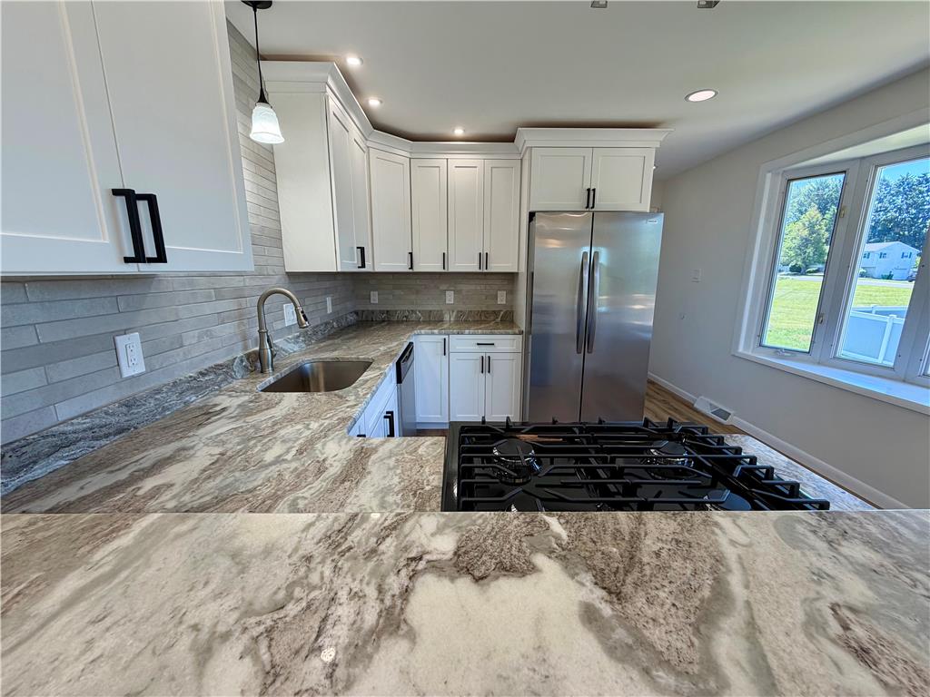 3508 Nazareth Road Easton, PA 18045 - Photo 16 of 25 A well-appointed kitchen showcasing elegant granite countertops and modern appliances.