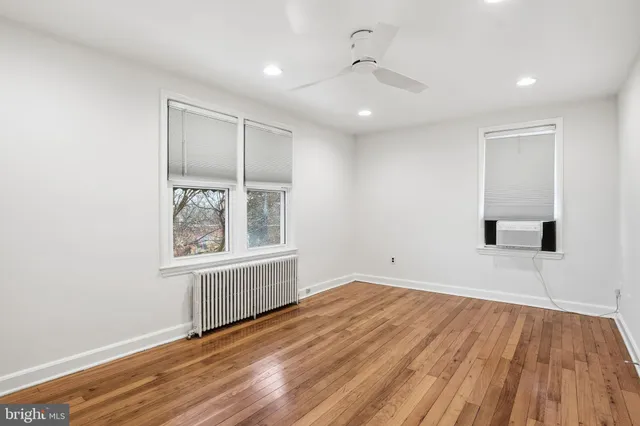 a bathroom with a bathtub and a sink