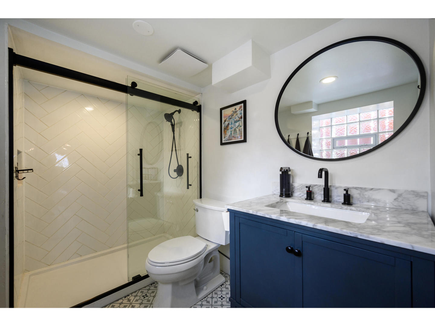 4500 North Harding Avenue Chicago, IL 60625 - Photo 18 of 29 a bathroom with a toilet a sink and a mirror