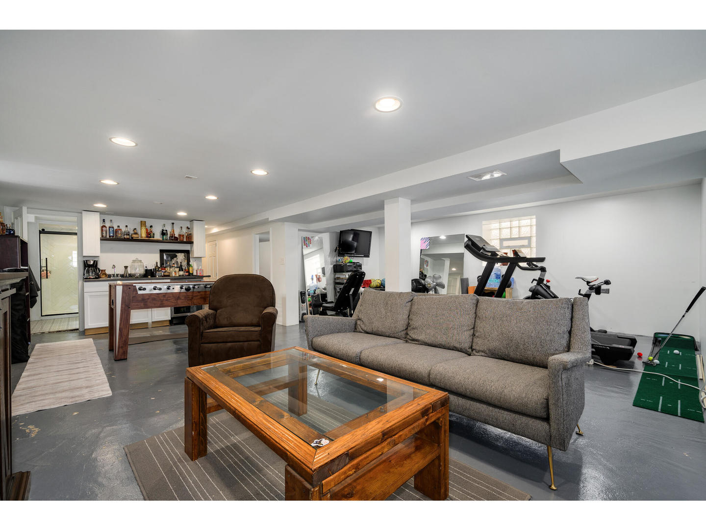 4500 North Harding Avenue Chicago, IL 60625 - Photo 20 of 29 a living room with furniture kitchen view and a table