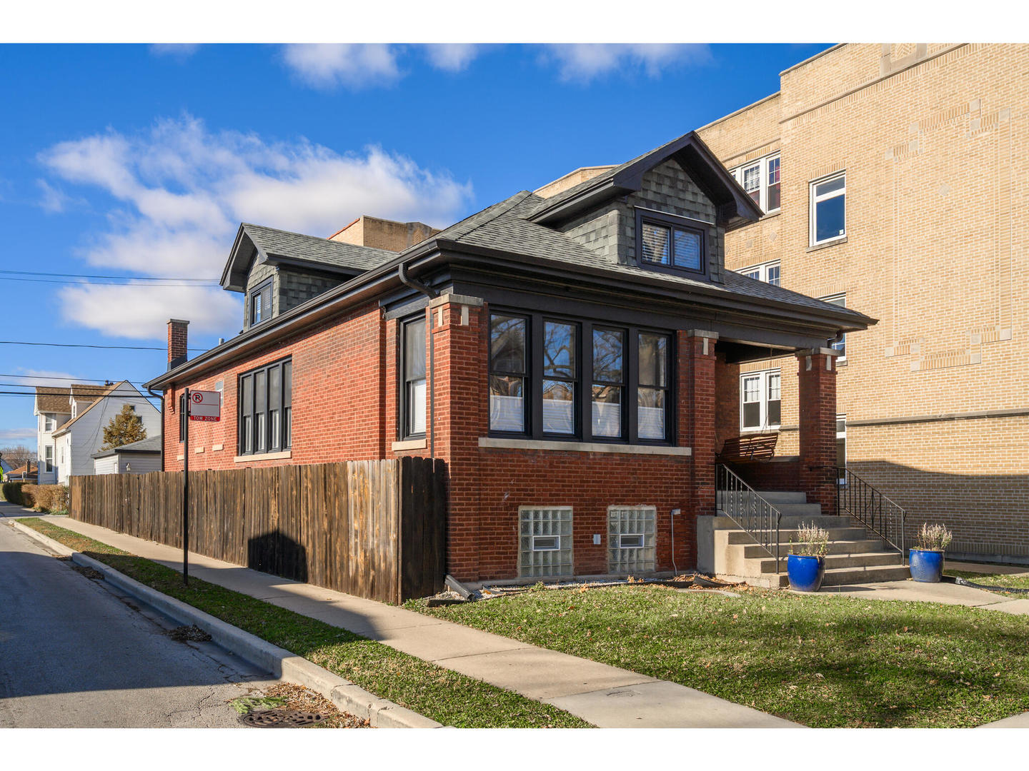 4500 North Harding Avenue Chicago, IL 60625 - Photo 2 of 29 a front view of a house with a yard