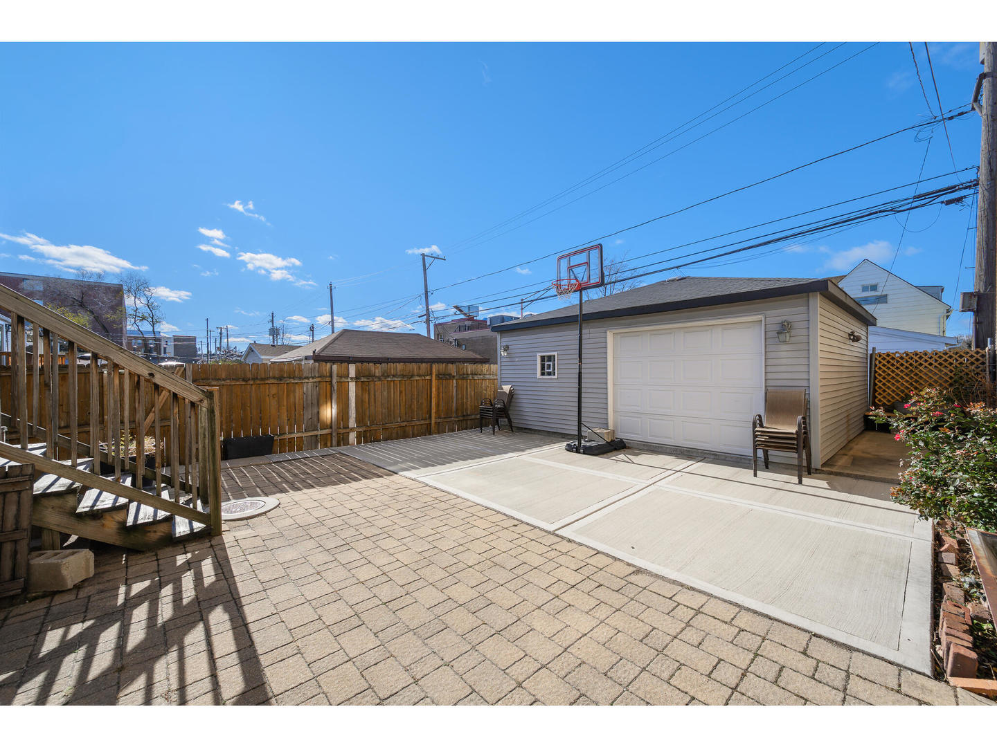 4500 North Harding Avenue Chicago, IL 60625 - Photo 26 of 29 a view of a patio with table and chairs under an umbrella