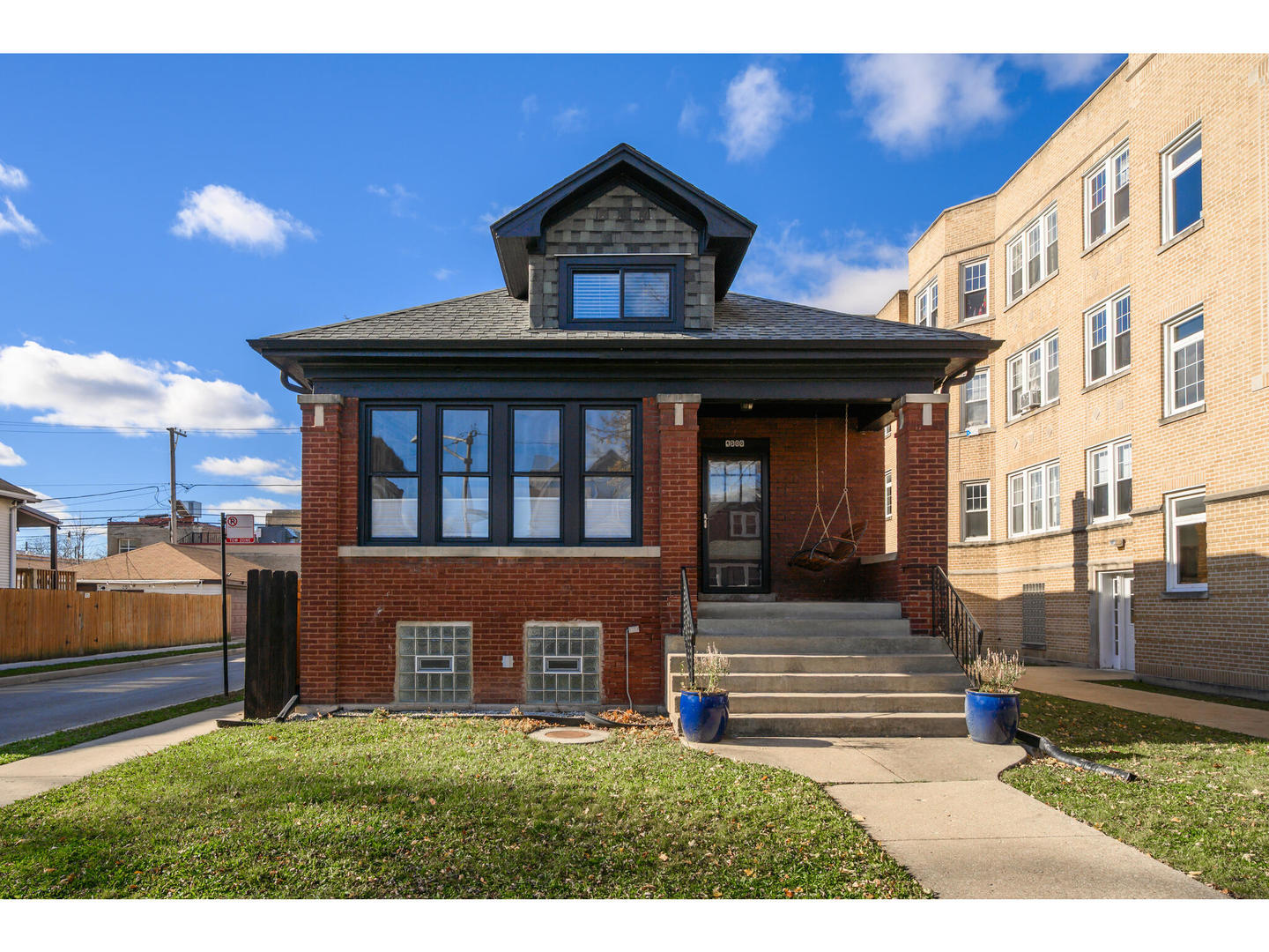 4500 North Harding Avenue Chicago, IL 60625 - Photo 29 of 29 a front view of a house with a garden