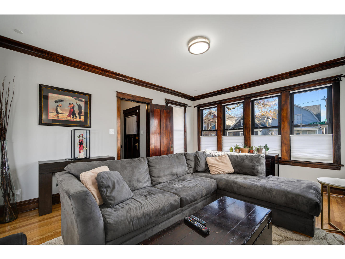 4500 North Harding Avenue Chicago, IL 60625 - Photo 4 of 29 a living room with furniture and large window