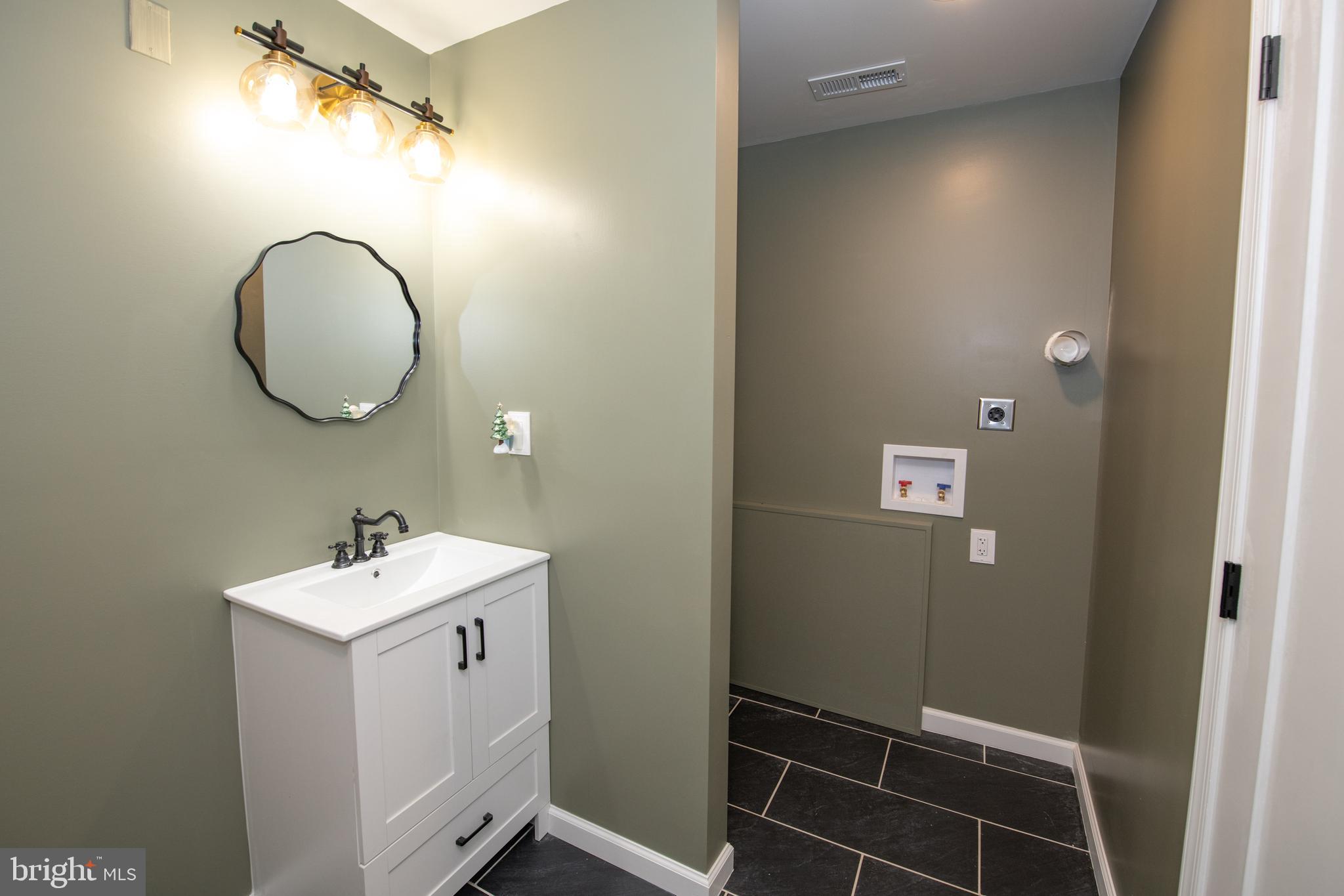 30 Mistletoe Lane Levittown, PA 19054 - Photo 20 of 21 Laundry Area