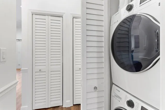 a close up of a bathroom with a sink and dryer