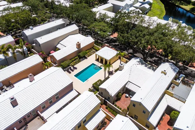 an aerial view of a house with a patio