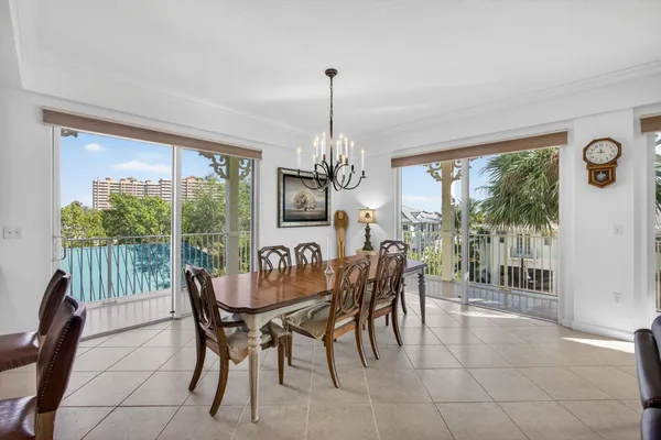 a kitchen with granite countertop a sink stainless steel appliances and cabinets
