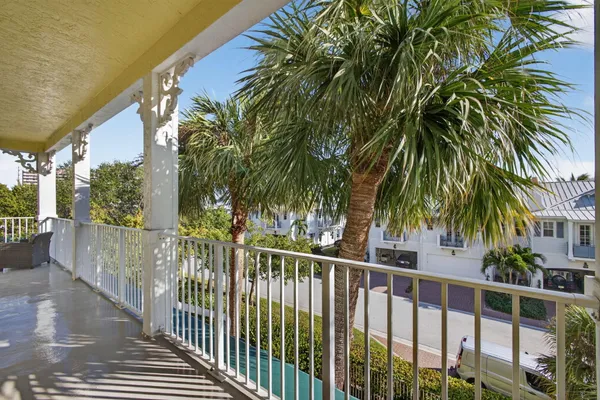 a bedroom with a bed and cabinets