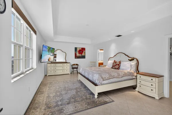 a spacious bathroom with a double vanity sink mirror and