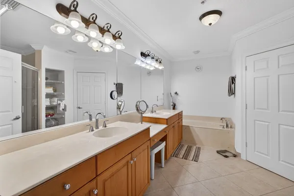 a view of a livingroom with furniture and a bathroom
