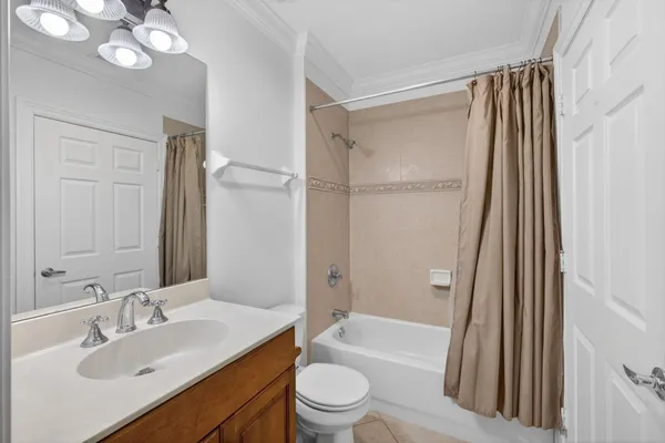 a view of room with cabinet and mirror