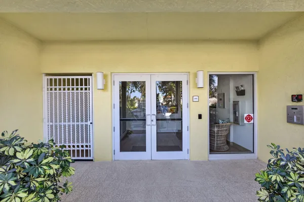 a living room with fireplace furniture and a flat screen tv
